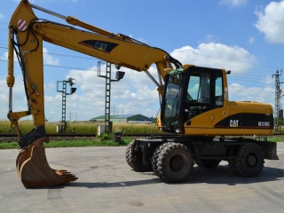  Колесный экскаватор Caterpillar M318C