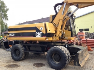  Колесный экскаватор Caterpillar M320