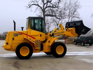  Фронтальный погрузчик New Holland LW110